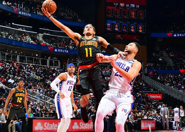  特雷杨助攻创新高，老鹰团队篮球击溃热火三巨头